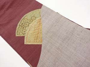 手織り紬切り嵌め風相良刺繍地紙に亀甲・菱模様名古屋帯